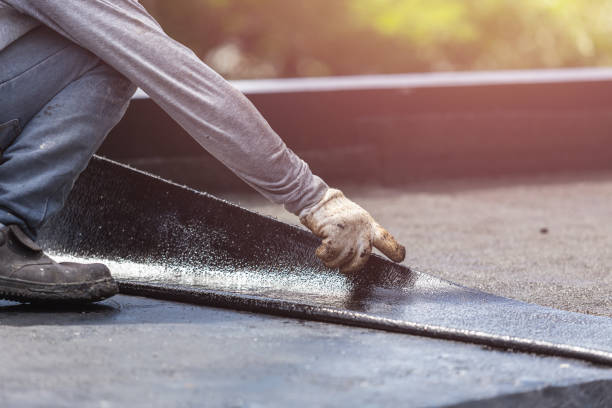 Professional Waterproofing technician working in Warsaw, IL